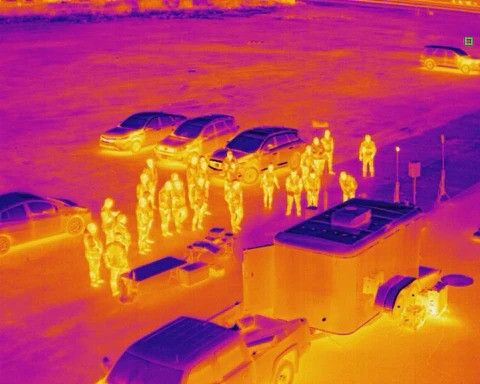 Thermal image with people in a parking, collected by Autel Evo ii Duo